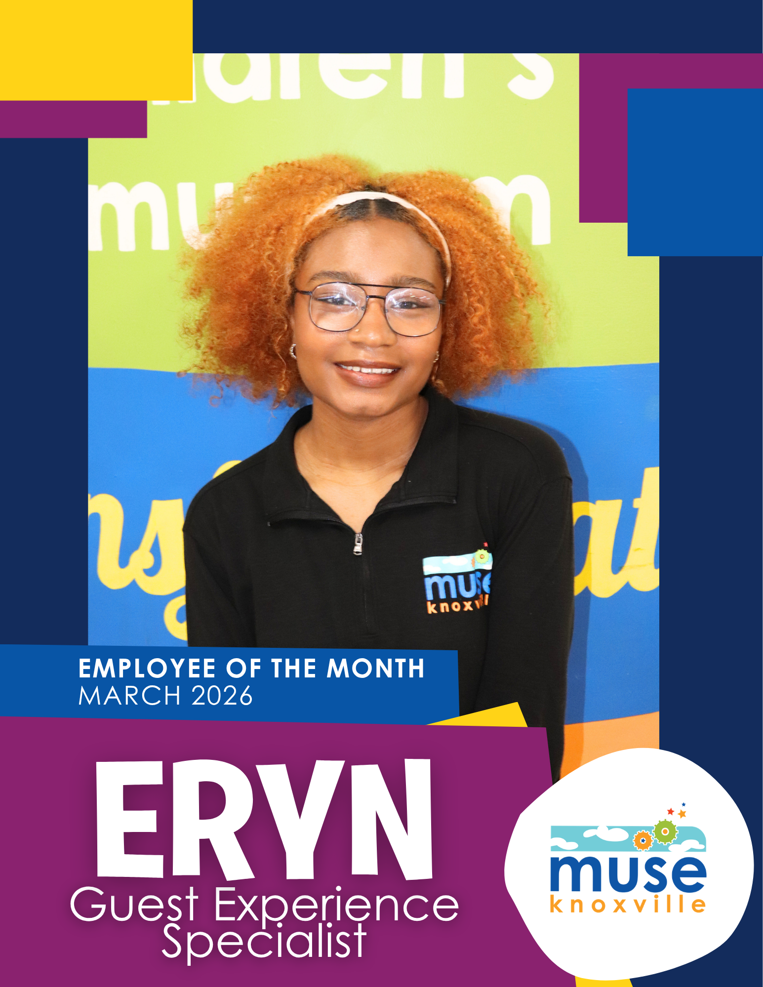 Photo of smiling young black man wearing a suit and bowtie at Muse Knoxville